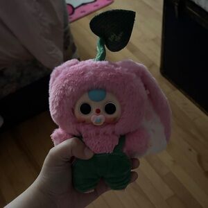 Pink Plush Toy with Green Overalls